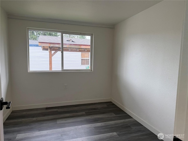 6411 201st Ave SW Unit 21, Centralia, WA 98531 - empty room featuring healthy amount of natural light and dark wood finished floors