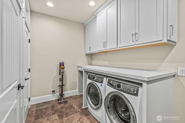 2608 Cascade Way, Longview, WA 98632 - washroom with cabinet space, washing machine and dryer, stone finish flooring, and recessed lighting