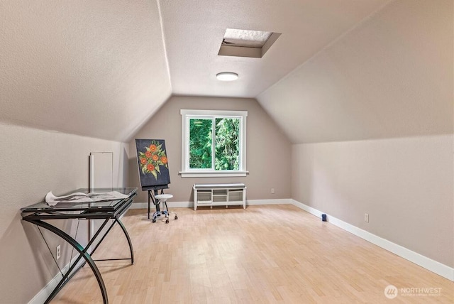 2608 Cascade Way, Longview, WA 98632 - bonus room with wood finished floors, vaulted ceiling, and a textured ceiling