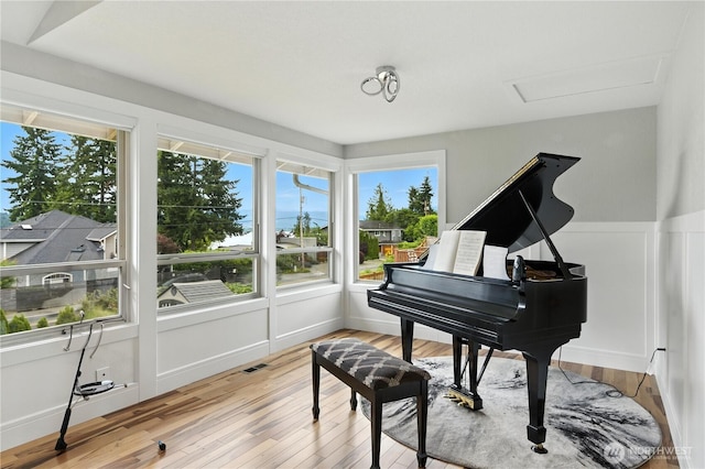 2500 171st Ave SE, Bellevue, WA 98008 - sitting room featuring plenty of natural light, light wood-style floors, and attic access