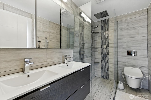 2500 171st Ave SE, Bellevue, WA 98008 - bathroom featuring tile walls, tiled shower, double vanity, and backsplash