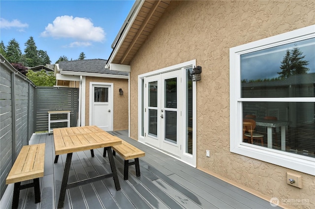 2500 171st Ave SE, Bellevue, WA 98008 - wooden deck with outdoor dining area and french doors