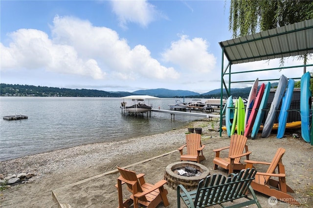 2500 171st Ave SE, Bellevue, WA 98008 - dock featuring a fire pit, boat lift, and a water and mountain view