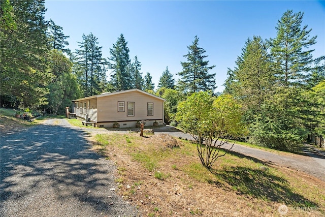 301 Salmonberry Ln, Friday Harbor, WA 98250 - view of front of house with gravel driveway