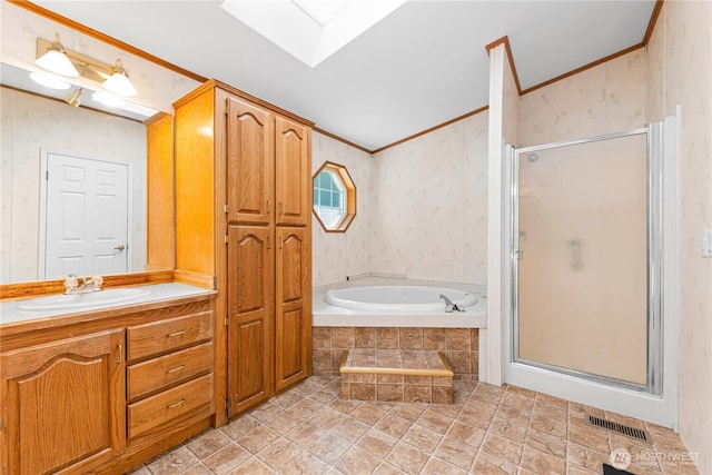 301 Salmonberry Ln, Friday Harbor, WA 98250 - full bathroom featuring crown molding, a garden tub, a stall shower, vanity, and a skylight