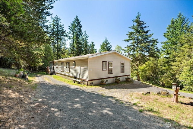 301 Salmonberry Ln, Friday Harbor, WA 98250 - view of front of property with gravel driveway