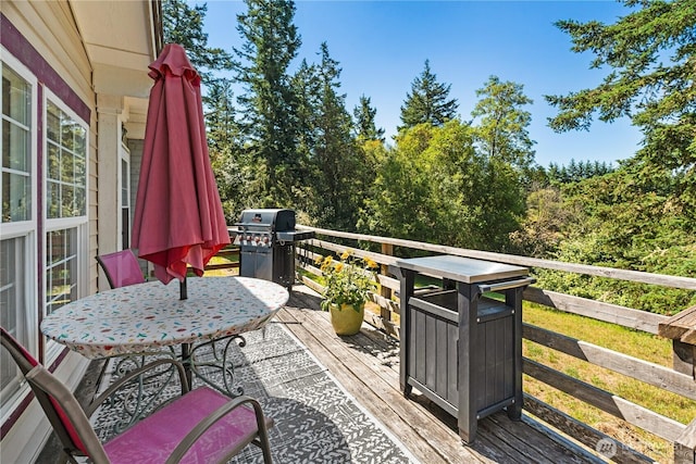 301 Salmonberry Ln, Friday Harbor, WA 98250 - wooden deck featuring a grill