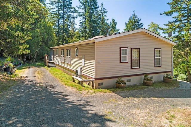 301 Salmonberry Ln, Friday Harbor, WA 98250 - view of side of home with crawl space and driveway