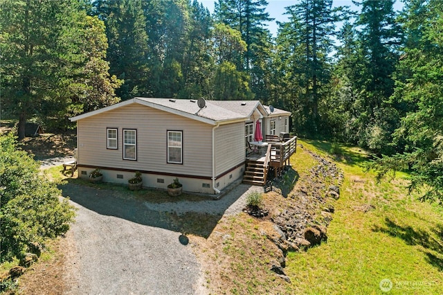 301 Salmonberry Ln, Friday Harbor, WA 98250 - view of front of property featuring crawl space, dirt driveway, and a deck