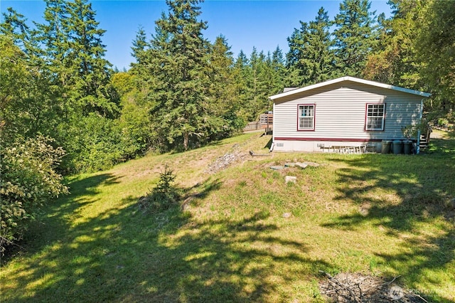 301 Salmonberry Ln, Friday Harbor, WA 98250 - view of green lawn with a wooded view
