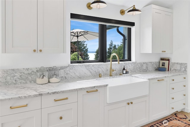 405 Bayside Rd, Bellingham, WA 98225 - kitchen with white cabinets and light stone countertops