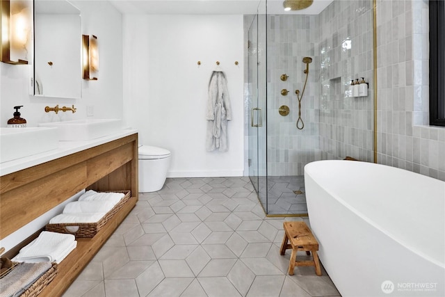 405 Bayside Rd, Bellingham, WA 98225 - full bath featuring a freestanding bath, a stall shower, vanity, and tile patterned floors