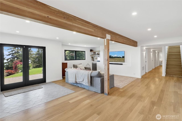 405 Bayside Rd, Bellingham, WA 98225 - bedroom featuring recessed lighting, access to exterior, beamed ceiling, and light wood-style flooring