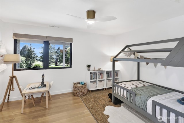 405 Bayside Rd, Bellingham, WA 98225 - bedroom with wood finished floors and ceiling fan