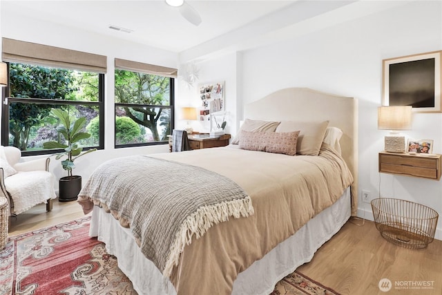 405 Bayside Rd, Bellingham, WA 98225 - bedroom with wood finished floors and a ceiling fan