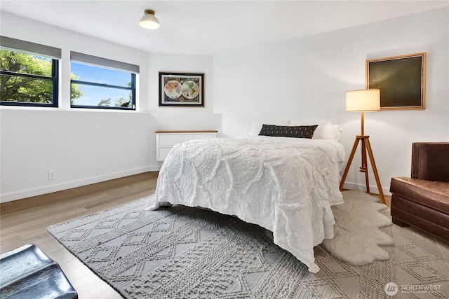 405 Bayside Rd, Bellingham, WA 98225 - bedroom featuring wood finished floors and baseboards