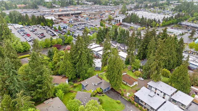 8221 122nd Ave NE, Kirkland, WA 98033 - aerial view of property and surrounding area featuring a tree filled landscape