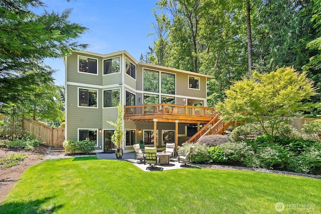 2507 101st Ln NE, Bellevue, WA 98004 - back of property featuring a wooden deck, stairs, and a patio area