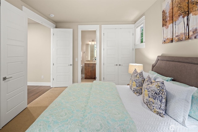 2507 101st Ln NE, Bellevue, WA 98004 - bedroom with a closet, ensuite bath, and carpet flooring