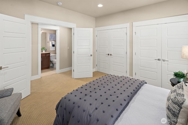 2507 101st Ln NE, Bellevue, WA 98004 - bedroom featuring light colored carpet, recessed lighting, and two closets