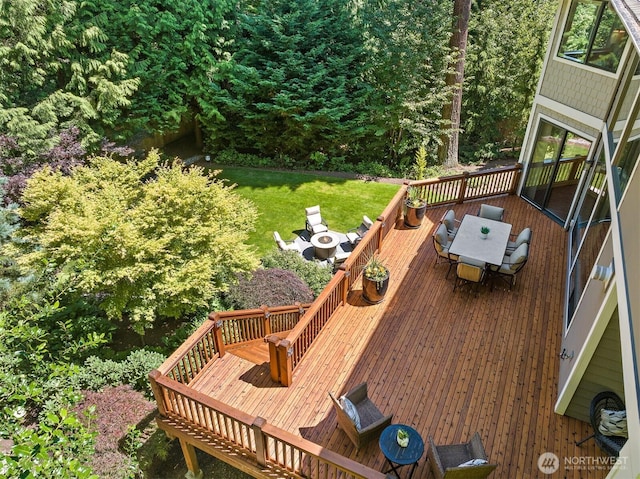 2507 101st Ln NE, Bellevue, WA 98004 - wooden deck with outdoor dining area and a yard