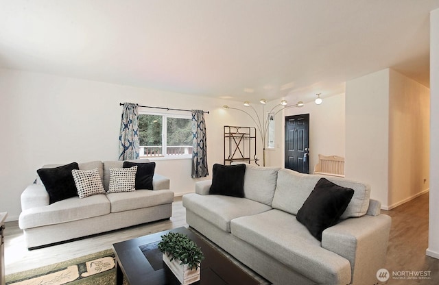5845 Alpha Ln, Freeland, WA 98249 - living area featuring wood finished floors and baseboards