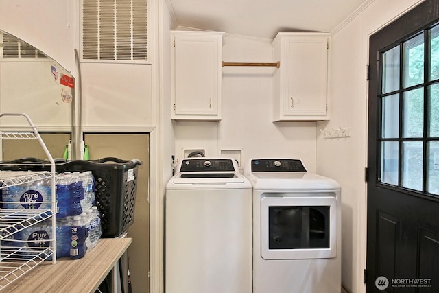 5845 Alpha Ln, Freeland, WA 98249 - laundry room with cabinet space and washer and dryer