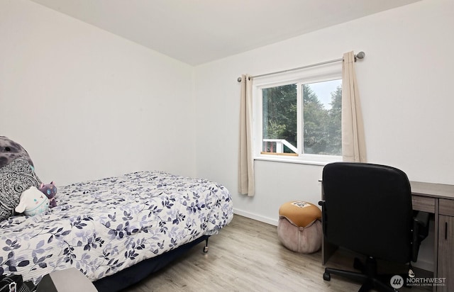 5845 Alpha Ln, Freeland, WA 98249 - bedroom with light wood-style flooring and a desk