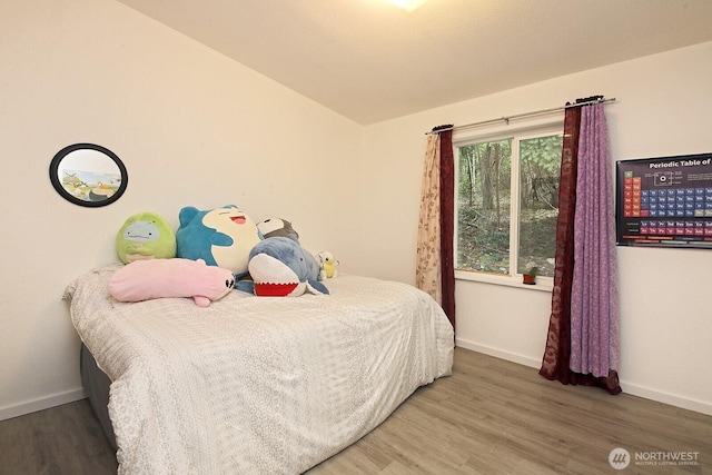 5845 Alpha Ln, Freeland, WA 98249 - bedroom with wood finished floors and lofted ceiling