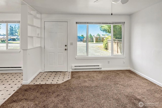 1211 108th St SW, Everett, WA 98204 - entrance foyer with a baseboard heating unit, a ceiling fan, and carpet floors