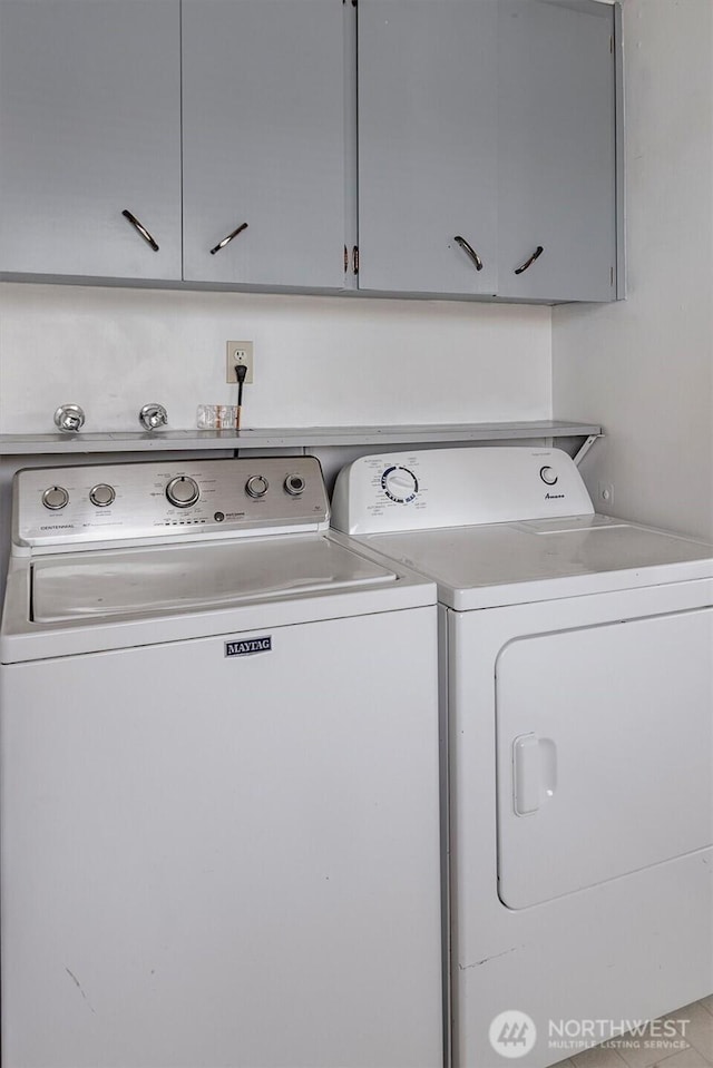 1211 108th St SW, Everett, WA 98204 - laundry area featuring cabinet space and washer and clothes dryer