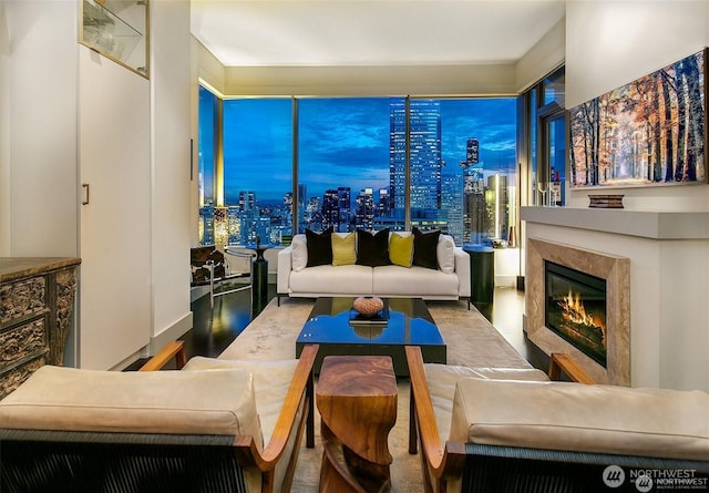 737 Olive Way Unit 3606, Seattle, WA 98101 - living room featuring wood finished floors and a fireplace