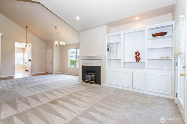 23302 53rd Ave S Unit 4-1, Kent, WA 98032 - unfurnished living room featuring a chandelier, carpet floors, high vaulted ceiling, and recessed lighting