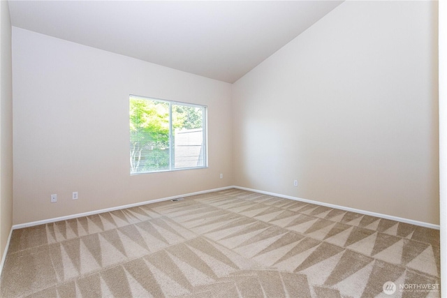 23302 53rd Ave S Unit 4-1, Kent, WA 98032 - spare room featuring light carpet and vaulted ceiling