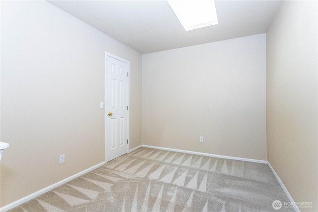 23302 53rd Ave S Unit 4-1, Kent, WA 98032 - spare room featuring carpet and a skylight