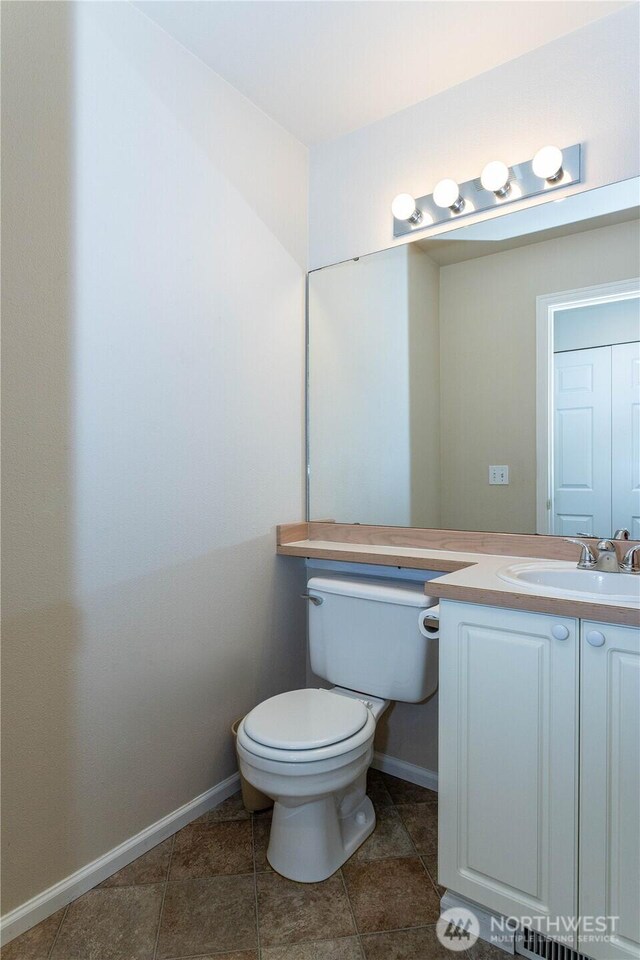 23302 53rd Ave S Unit 4-1, Kent, WA 98032 - bathroom with vanity and tile patterned flooring