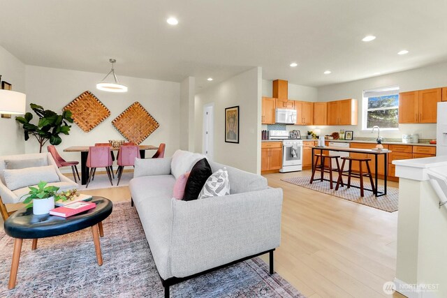 4241 S Eddy St, Seattle, WA 98118 - living room with light wood-style floors and recessed lighting