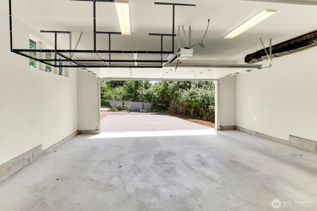 4241 S Eddy St, Seattle, WA 98118 - garage featuring a garage door opener