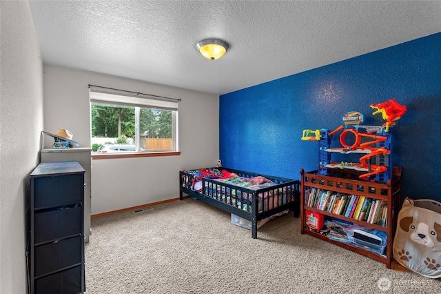 6137 189th Loop SW, Rochester, WA 98579 - bedroom with carpet flooring and a textured ceiling