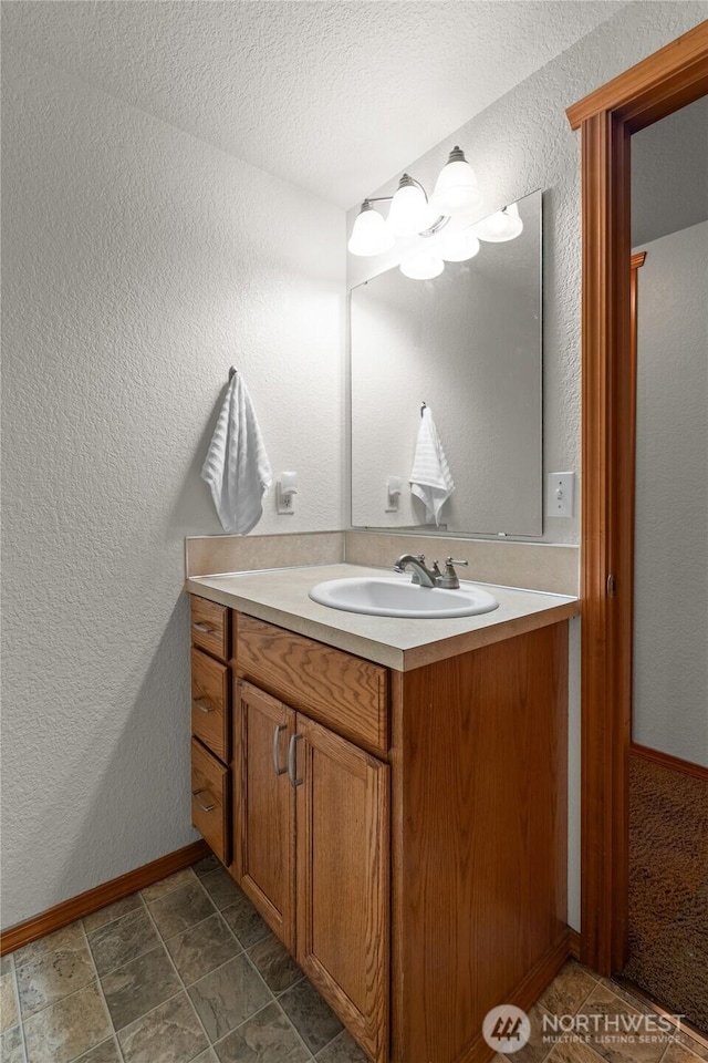 6137 189th Loop SW, Rochester, WA 98579 - bathroom featuring vanity and a textured wall