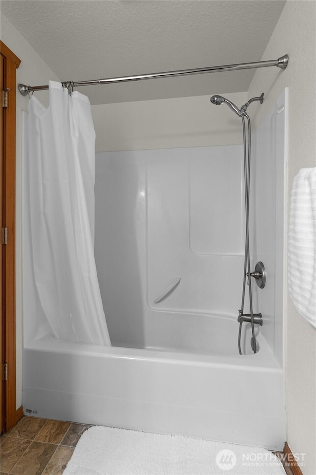 6137 189th Loop SW, Rochester, WA 98579 - full bathroom featuring shower / tub combo and a textured ceiling