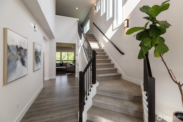 2035 S Fruitland, Puyallup, WA 98371 - staircase with wood finished floors, a high ceiling, and recessed lighting
