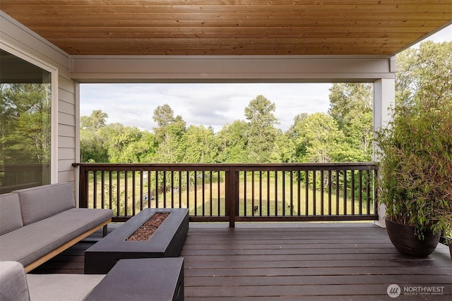 2035 S Fruitland, Puyallup, WA 98371 - wooden deck with an outdoor living space with a fire pit