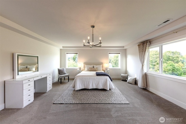 2035 S Fruitland, Puyallup, WA 98371 - bedroom featuring light colored carpet, a chandelier, and multiple windows