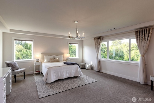 2035 S Fruitland, Puyallup, WA 98371 - bedroom with light colored carpet and a chandelier
