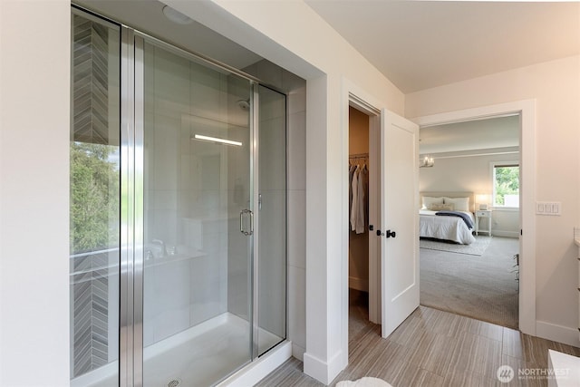 2035 S Fruitland, Puyallup, WA 98371 - full bath featuring a stall shower, connected bathroom, and a walk in closet