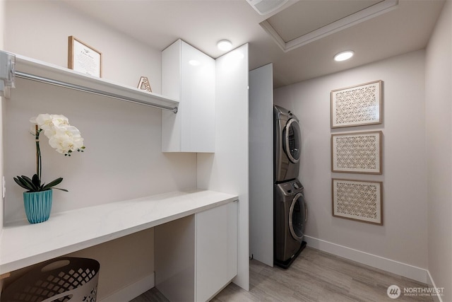 2035 S Fruitland, Puyallup, WA 98371 - laundry room featuring stacked washing machine and dryer, light wood-type flooring, and recessed lighting