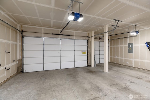 2035 S Fruitland, Puyallup, WA 98371 - garage featuring a garage door opener and electric panel