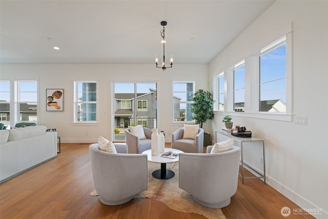 310 W Fir Loop, Washougal, WA 98671 - living area with healthy amount of natural light, wood finished floors, a chandelier, and recessed lighting