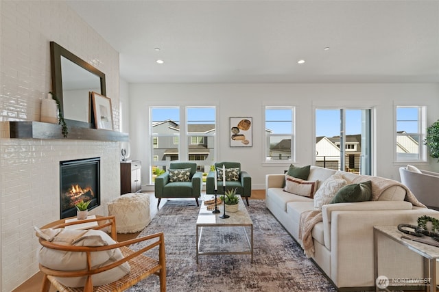 310 W Fir Loop, Washougal, WA 98671 - living room featuring plenty of natural light, a fireplace, wood finished floors, and recessed lighting